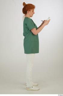 Photos Daya Jones Nurse in green Pose 2 preparing medication…